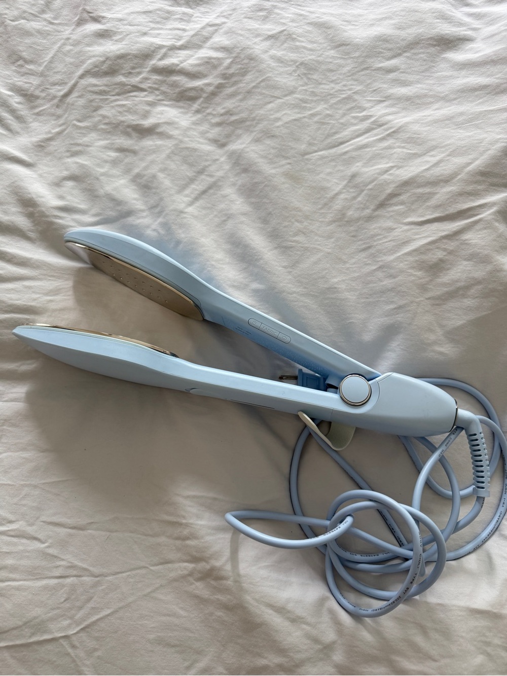 NORI light blue handheld iron